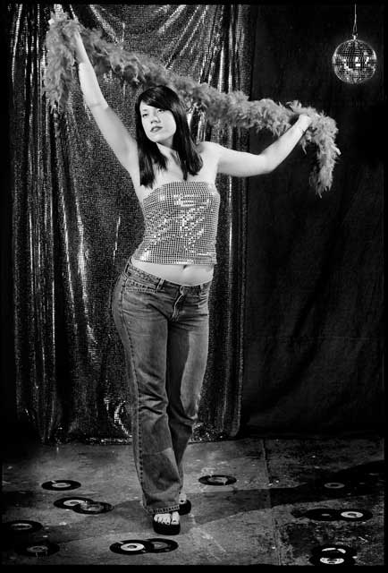 Young woman dancing at the disco